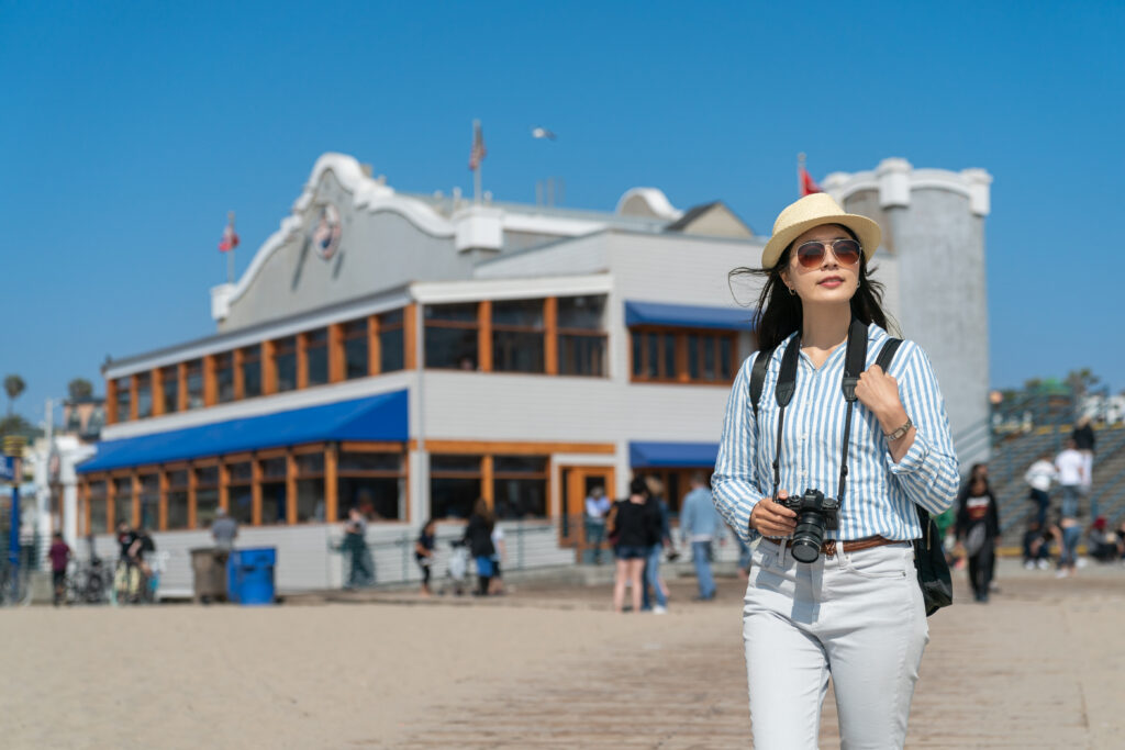 Girl near seafood restaurant at Santa Monica Pier 2023 11 27 04 49 21 UTC