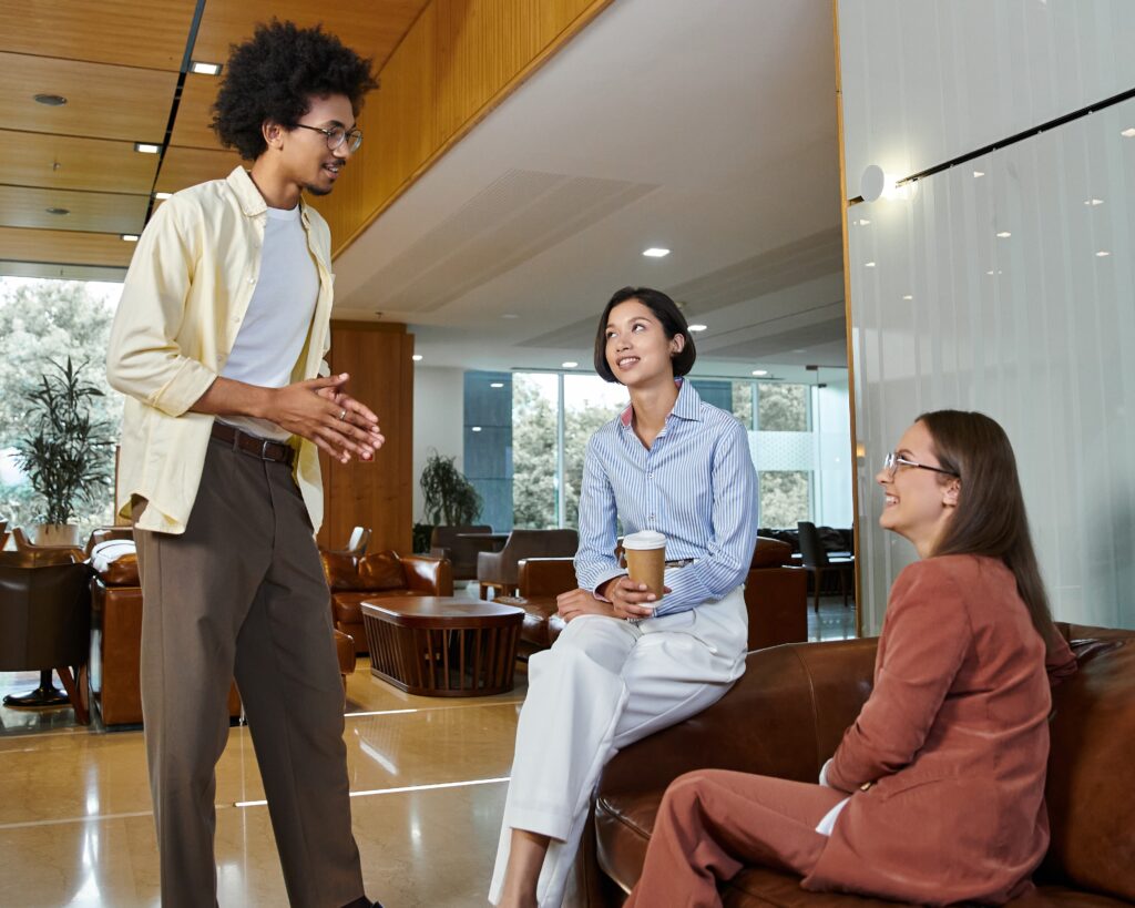 diverse colleagues chatting in office lobby 2024 11 16 08 50 59 utc 2